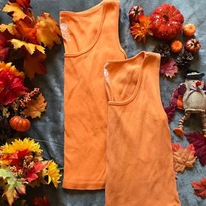 2 for 10$ orange tanks.